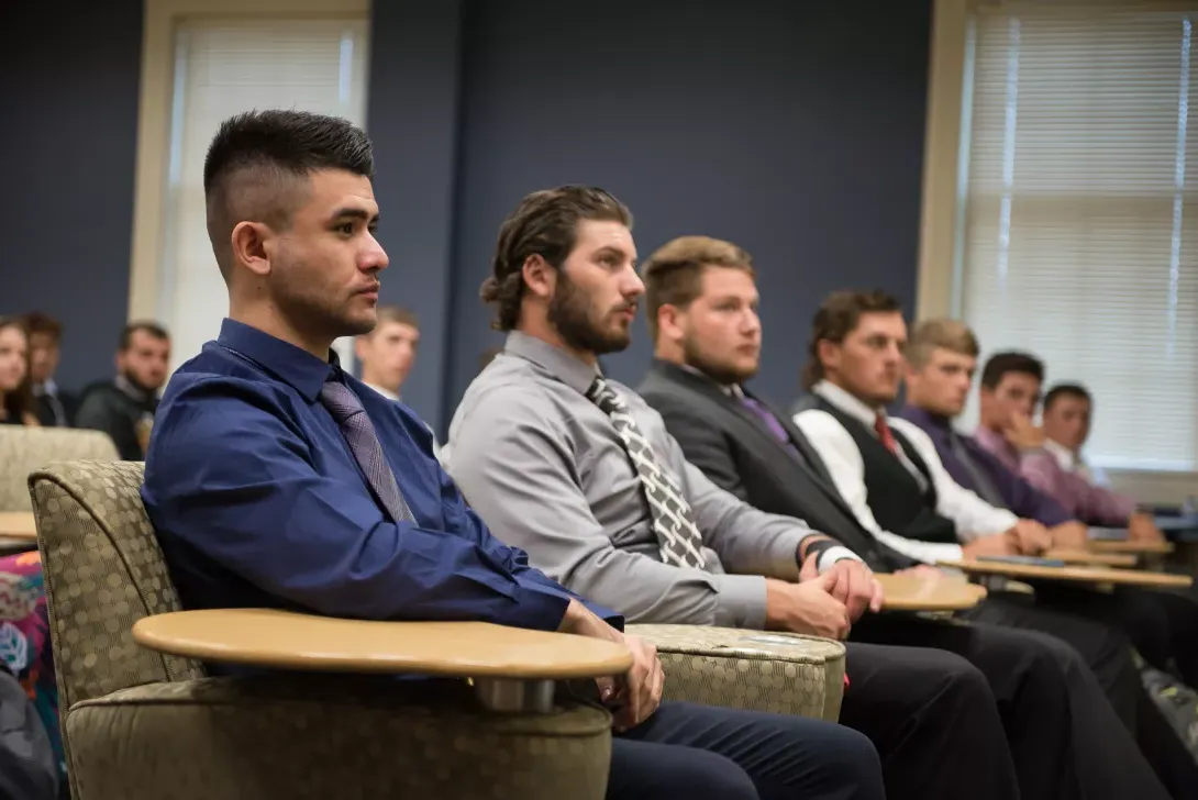 Students listening to a presentation at Career Day